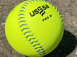 Worth 12" Super Gold Dot PRO M USSSA Slowpitch Softballs (Dozen): UM12CY -Baseball Equipment Shop PhotoMar11 121045PM